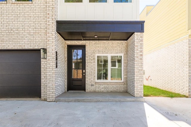 property entrance featuring a garage