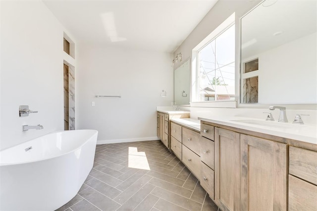 bathroom featuring vanity and a tub to relax in