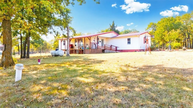 view of front of home with a front yard