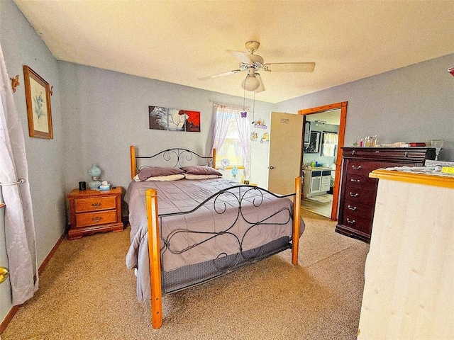 bedroom with light carpet and ceiling fan