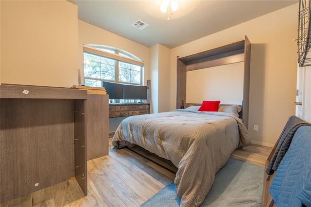 bedroom with light wood-type flooring