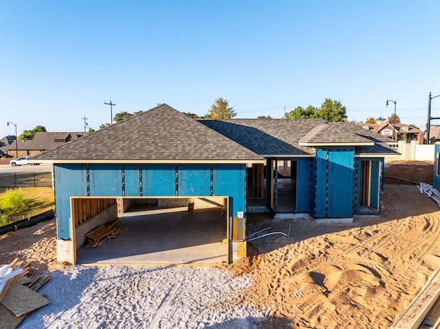 view of front of home with a carport