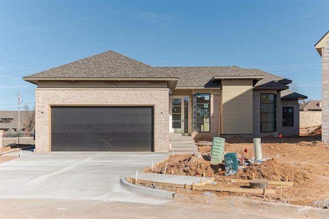 view of front of property with a garage