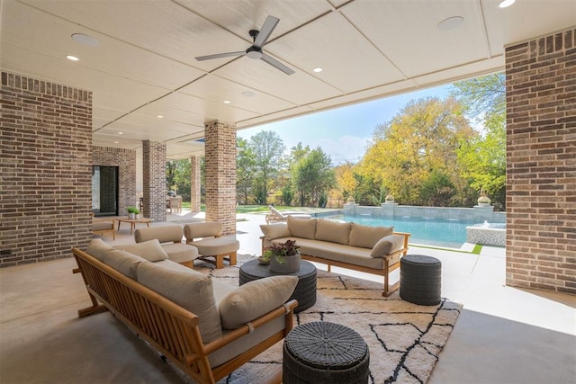 view of patio / terrace with pool water feature, ceiling fan, and an outdoor hangout area