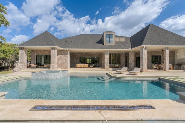 view of swimming pool with an outdoor living space, a patio, and ceiling fan