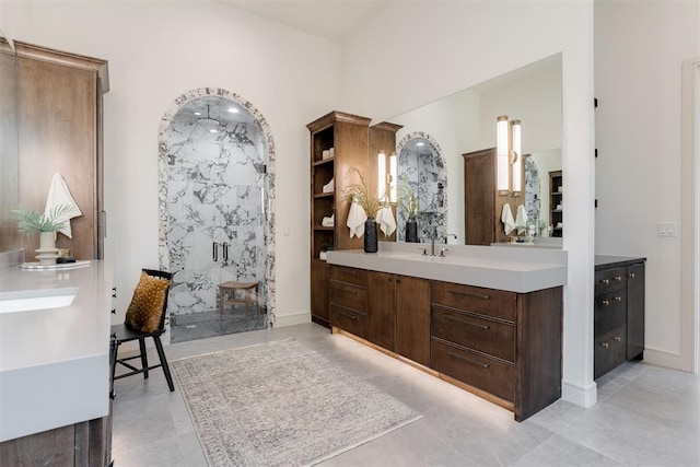 bathroom featuring vanity and walk in shower