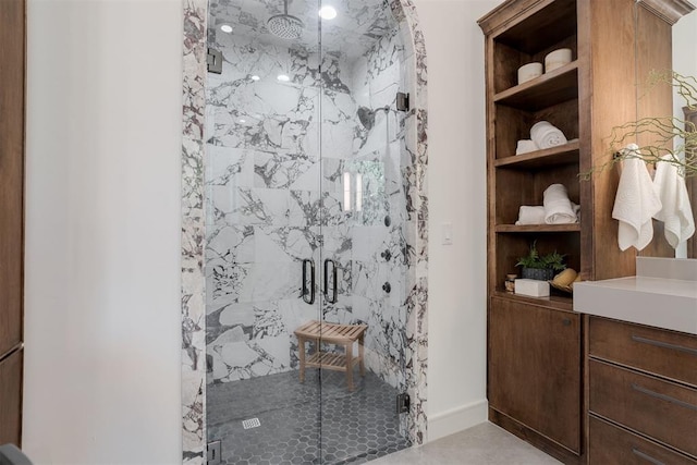 bathroom with vanity and walk in shower