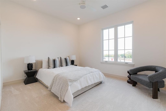 carpeted bedroom with ceiling fan