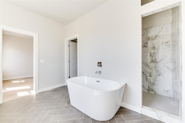 bathroom featuring tile patterned flooring and plus walk in shower