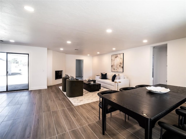 dining space featuring hardwood / wood-style floors