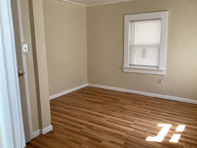 unfurnished room featuring light wood-type flooring