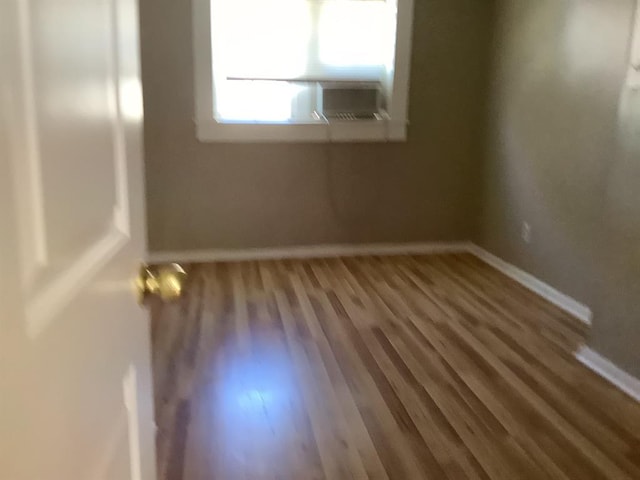 empty room featuring hardwood / wood-style floors