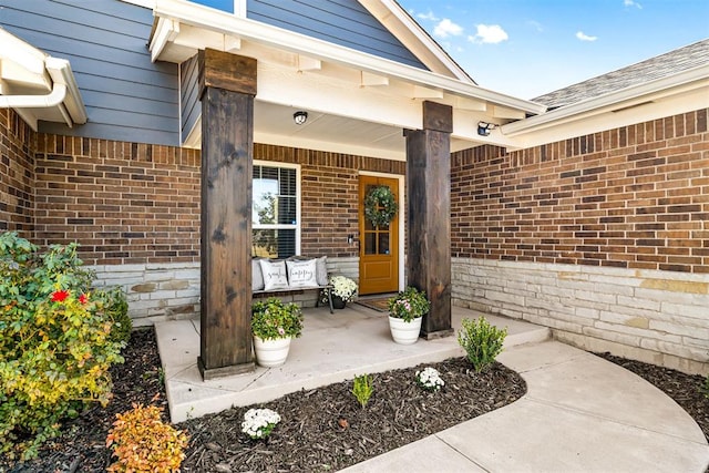 property entrance with covered porch