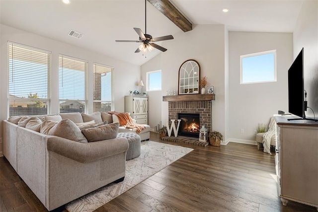 living room with high vaulted ceiling, a fireplace, dark wood-type flooring, and a wealth of natural light