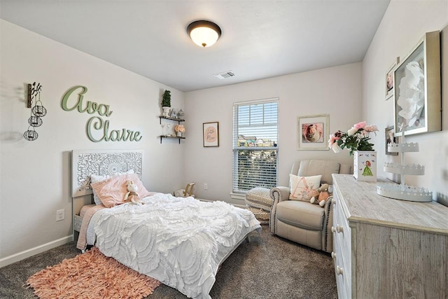 bedroom with dark carpet