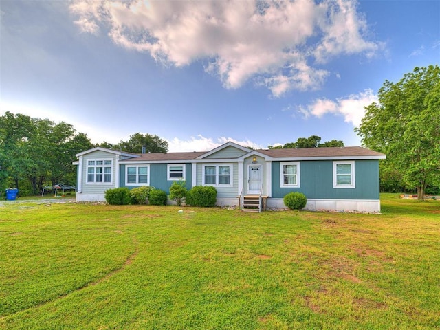 ranch-style home with a front yard