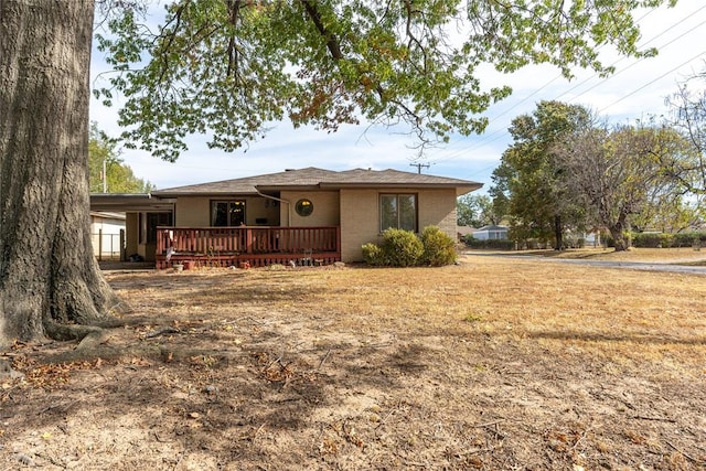 view of front of property with a deck