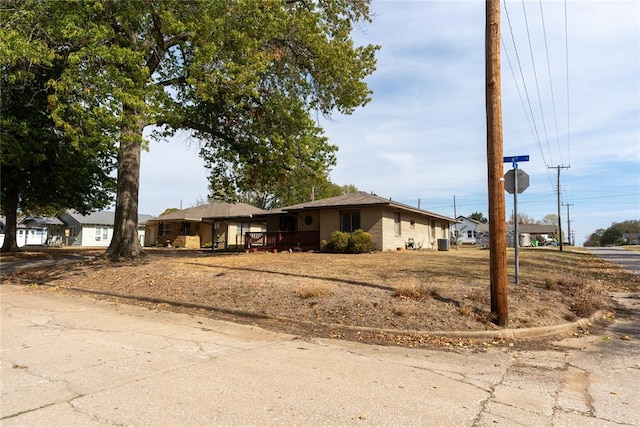 ranch-style house featuring a carport