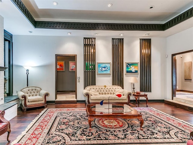 sitting room featuring wood-type flooring