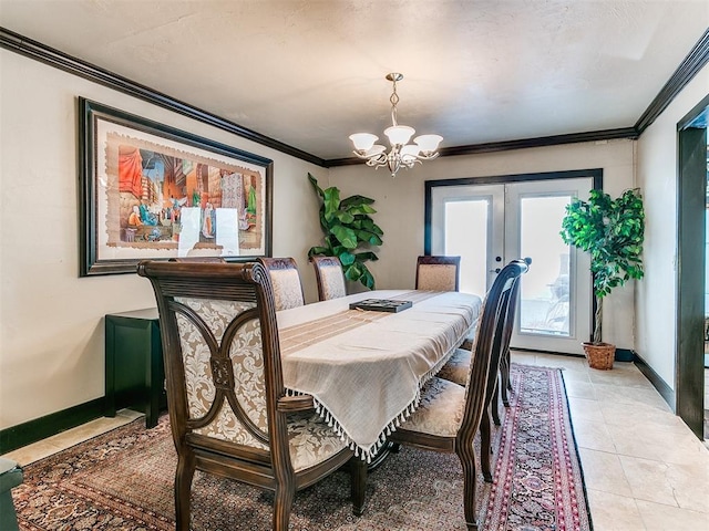 dining space with ornamental molding, french doors, a notable chandelier, and light tile patterned flooring