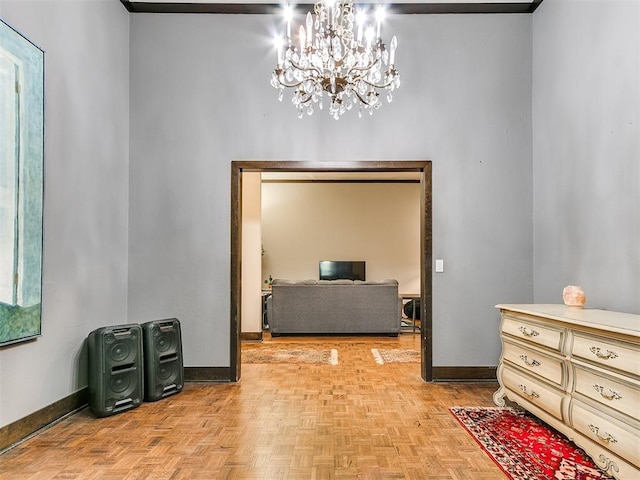 interior space featuring a chandelier and light parquet flooring