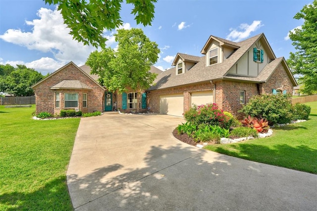 view of front of property with a garage and a front yard