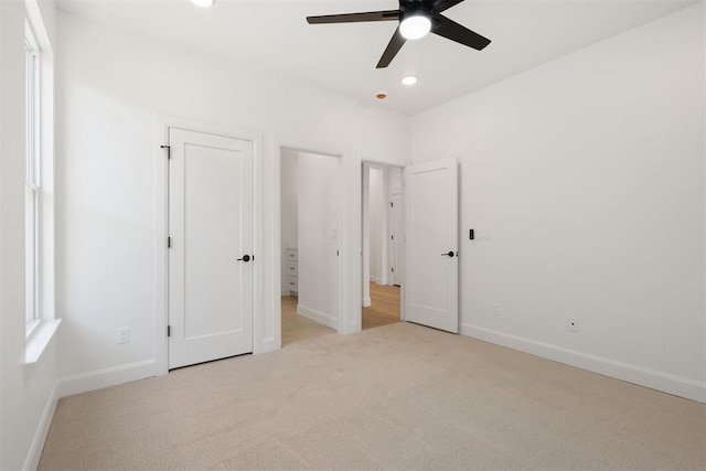 unfurnished bedroom with recessed lighting, baseboards, ceiling fan, and carpet flooring