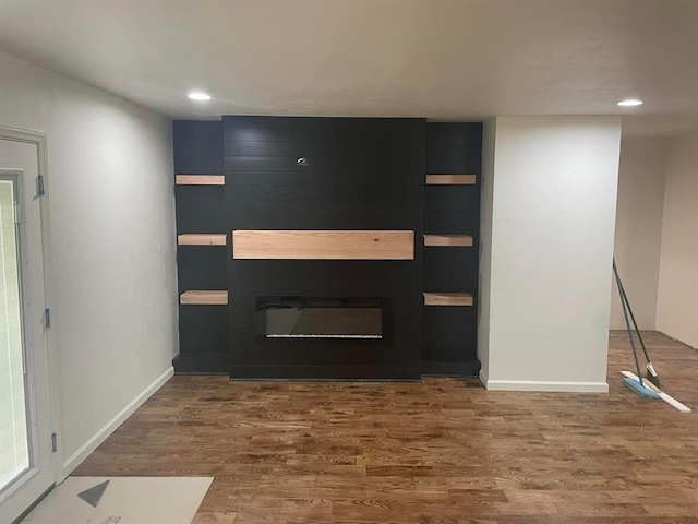 foyer entrance with hardwood / wood-style floors