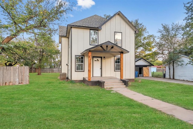 modern inspired farmhouse with an outbuilding and a front yard