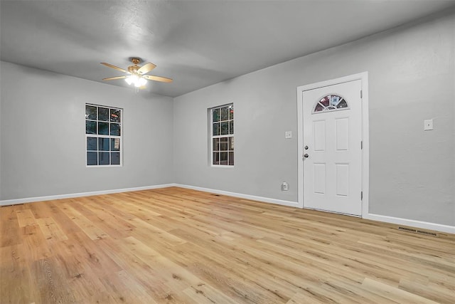 entryway featuring ceiling fan and light hardwood / wood-style floors