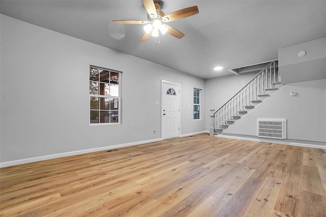 foyer featuring ceiling fan and light wood-type flooring