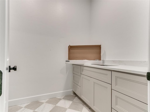 bathroom featuring baseboards