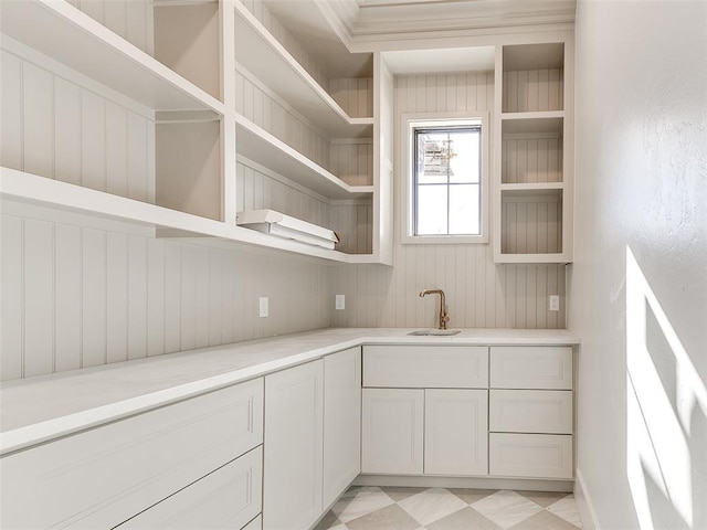 pantry featuring a sink