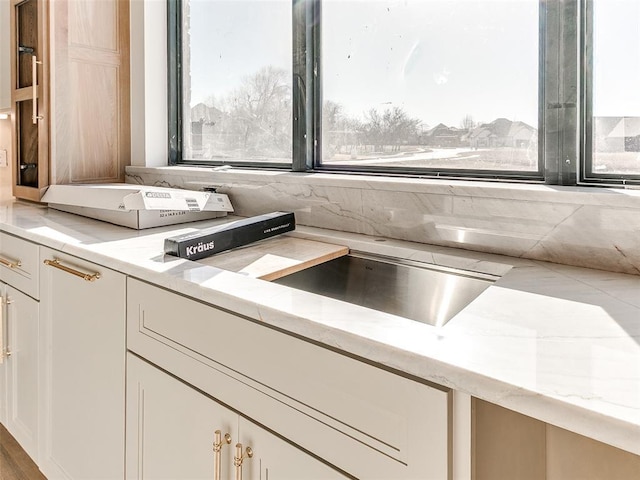 kitchen featuring white cabinetry