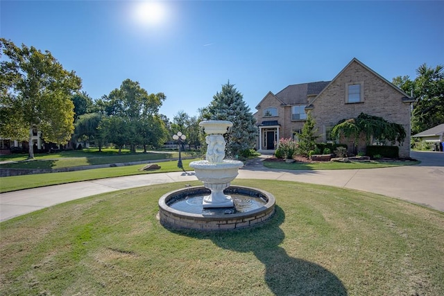 view of front facade with a front lawn