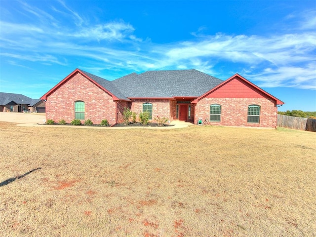 view of front of home with a front lawn