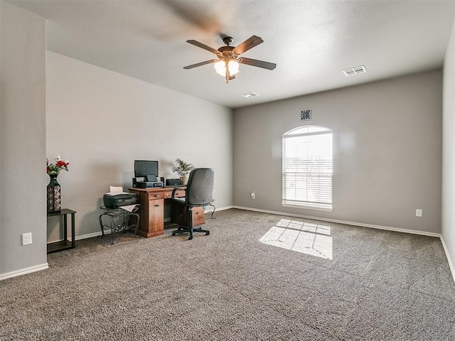 carpeted office with ceiling fan