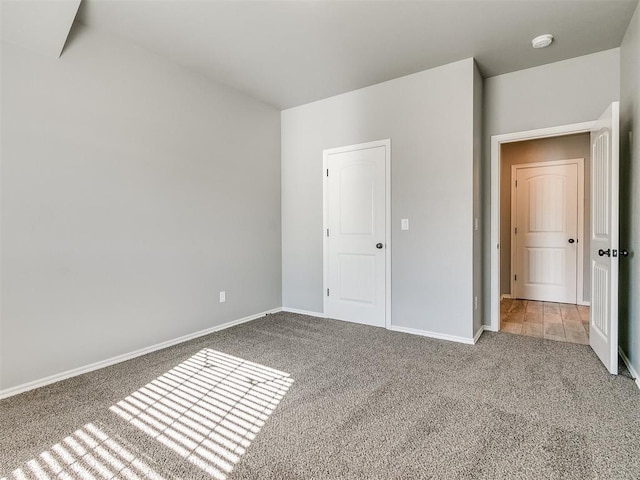 unfurnished bedroom featuring carpet floors