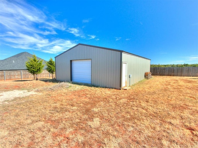 view of outbuilding featuring a garage