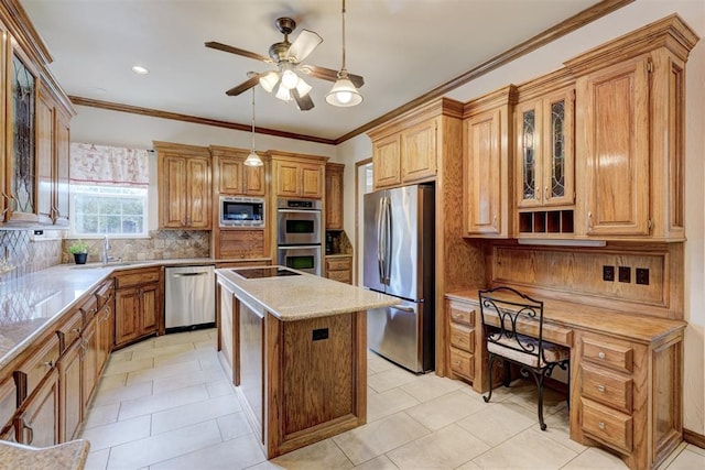 kitchen with pendant lighting, a center island, backsplash, ceiling fan, and stainless steel appliances