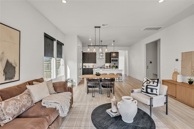 living room featuring light hardwood / wood-style flooring