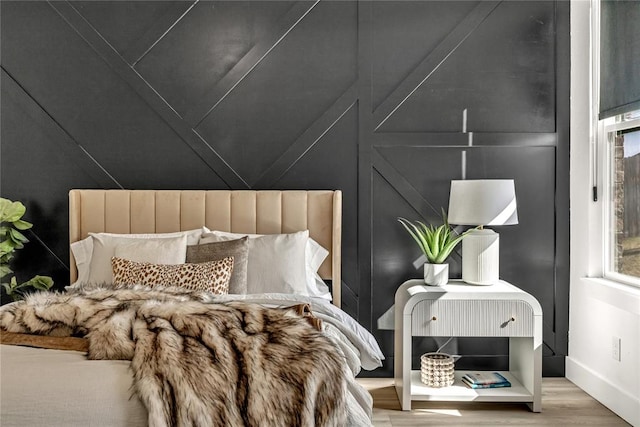 bedroom featuring hardwood / wood-style flooring