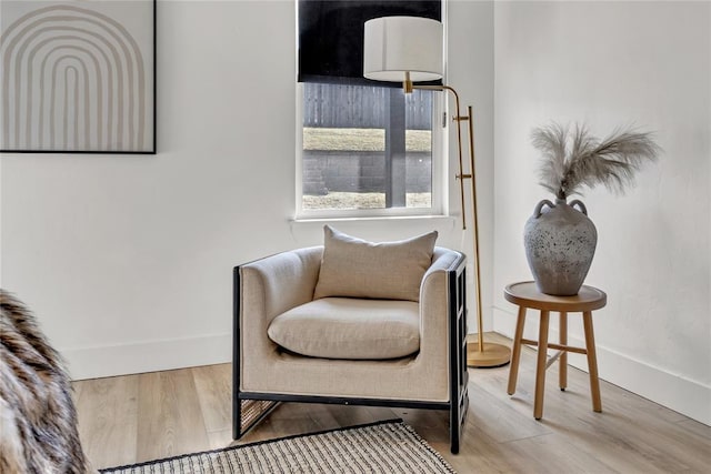 sitting room featuring hardwood / wood-style floors