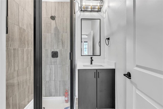 bathroom featuring vanity and walk in shower