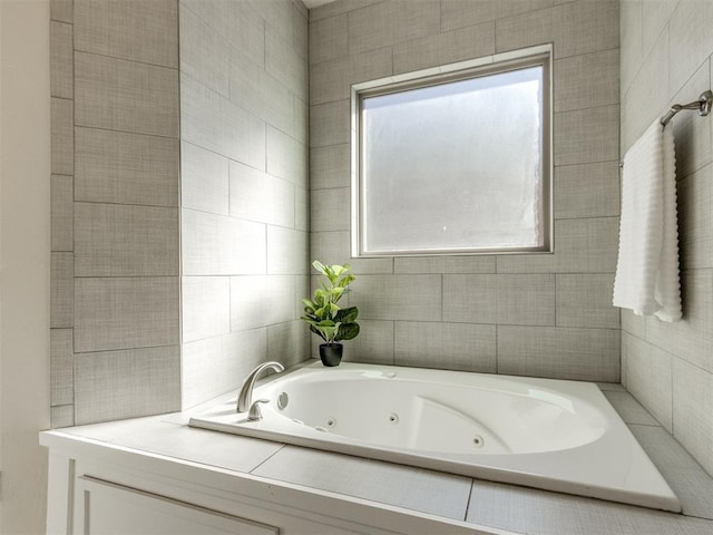 full bathroom featuring a jetted tub