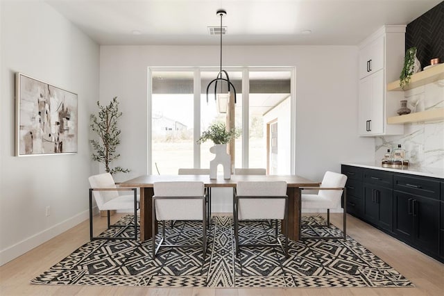 dining area featuring light hardwood / wood-style flooring