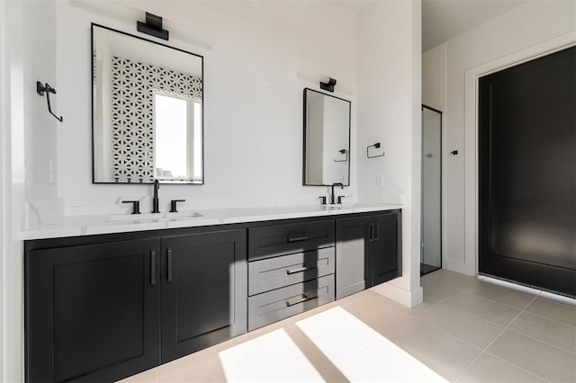 bathroom featuring tile patterned floors and vanity