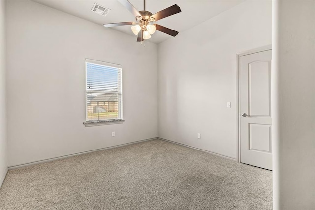 carpeted empty room with ceiling fan