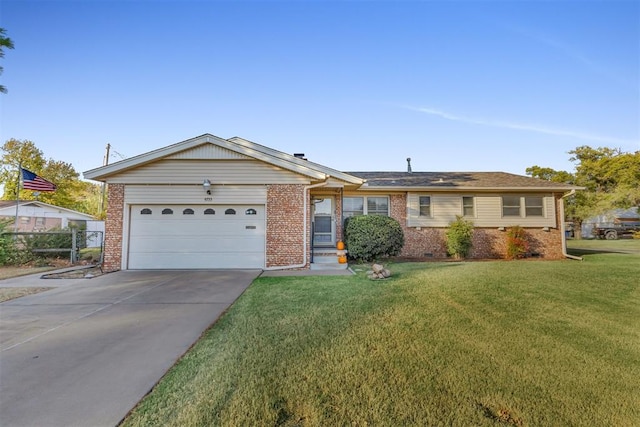 ranch-style house with a garage and a front lawn