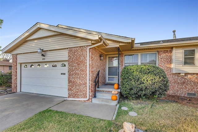 ranch-style home with a garage